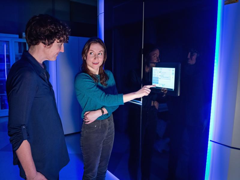 Melanie Ohi, Ph.D., and Jacquelyn Roberts examine the Titan Krios microscope